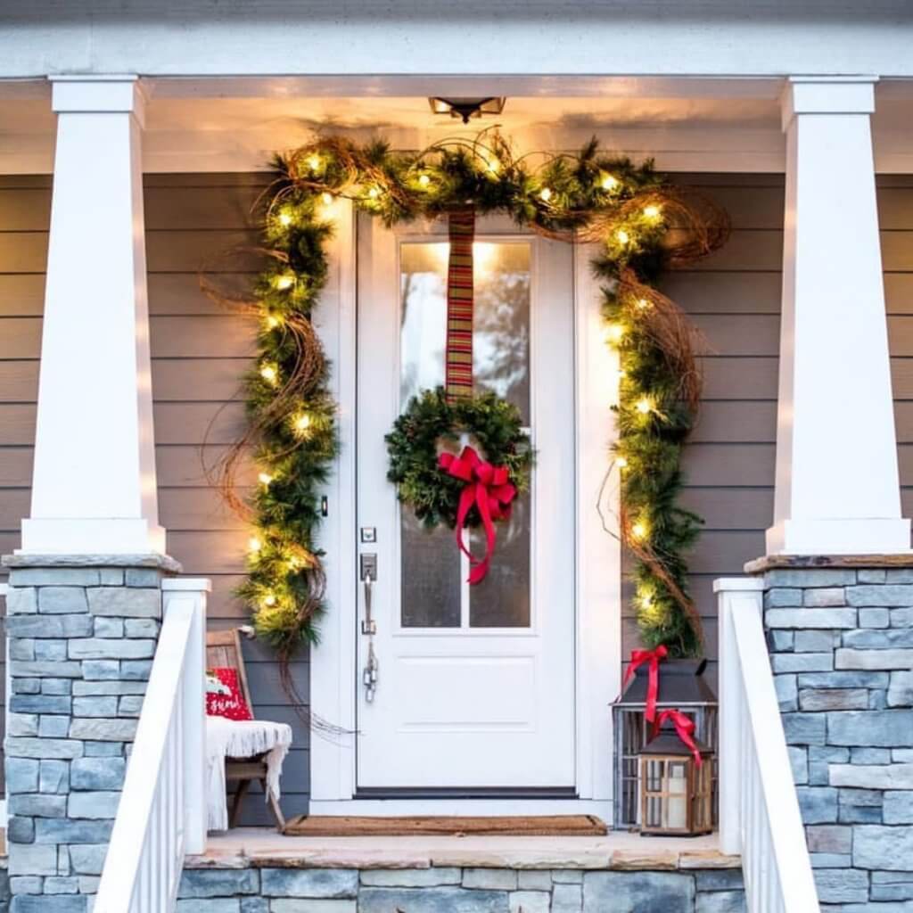 wreath and pine leaves on door